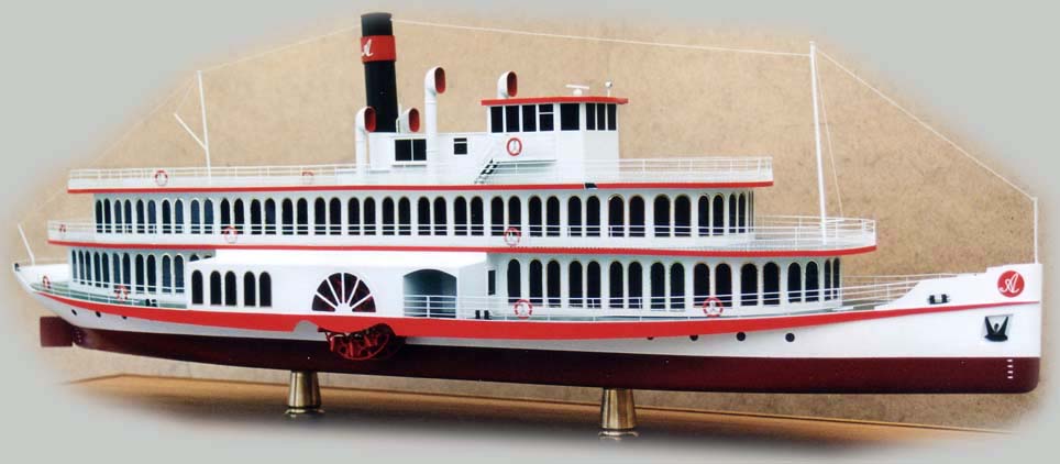 side paddle steamer side view, white body, vintage shaped windows